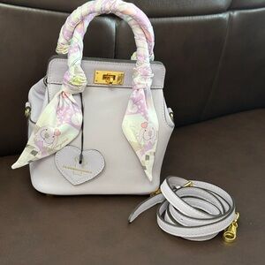 Littlebunnystore Elegant Purple and Gold Mini Bag with Structured Design